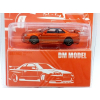 Nissan Skyline GT-R R34 orange - skala 1:64 - DM Model